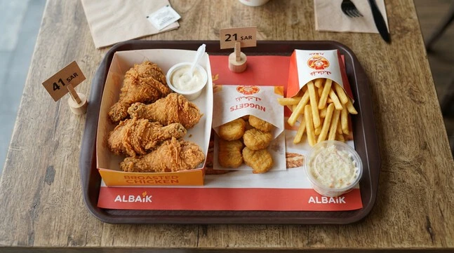 Albaik Abha popular meals with current prices including 8-piece chicken and nuggets