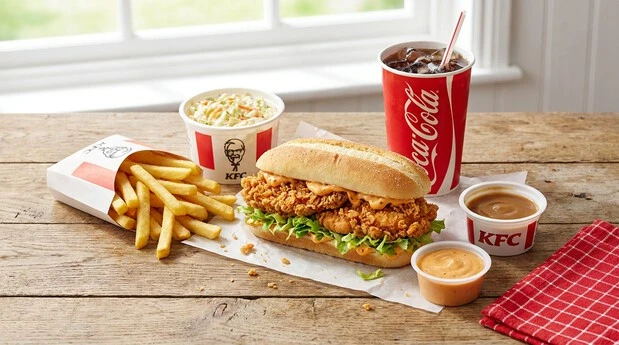 Zinger Combo meal from the KFC Makkah menu served with fries, coleslaw and a soft drink.